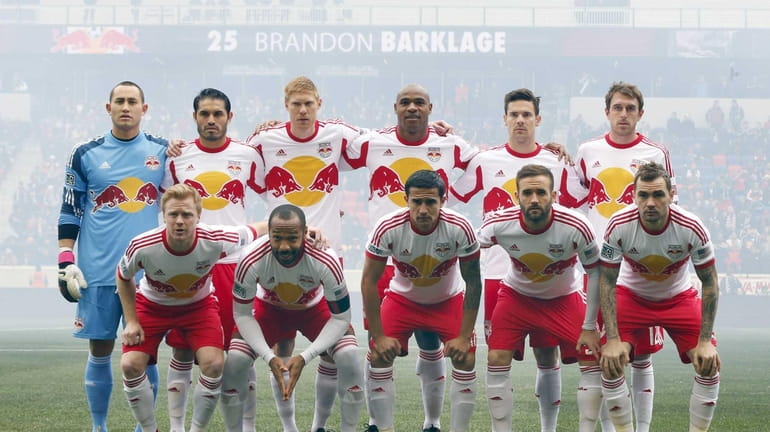The starting lineup of the Red Bulls pose for a...
