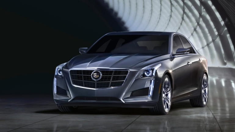 The Cadillac CTS moves up in size for 2014 --...