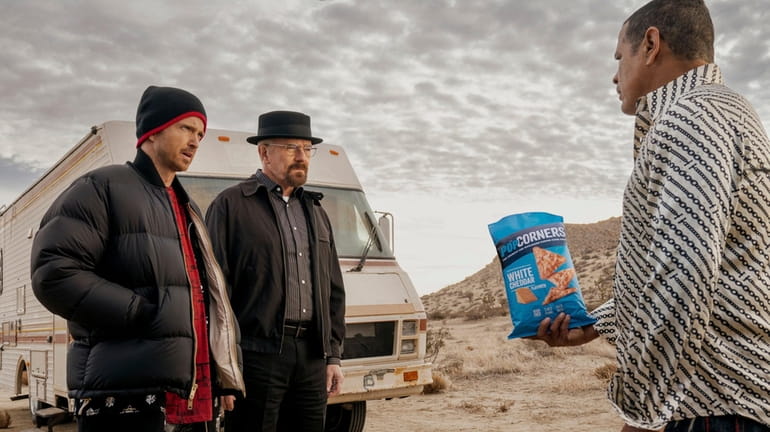 This photo provided by Frito-Lay shows Aaron Paul, Bryan Cranston...