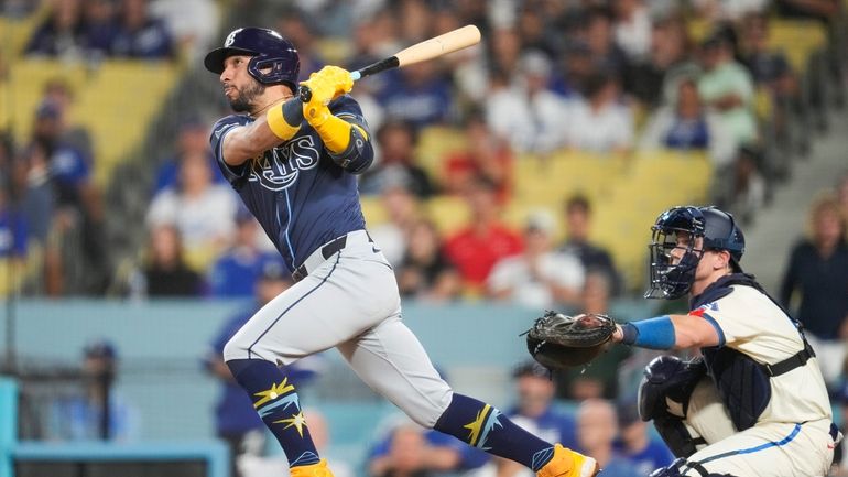 Tampa Bay Rays' José Caballero hits a home run during...