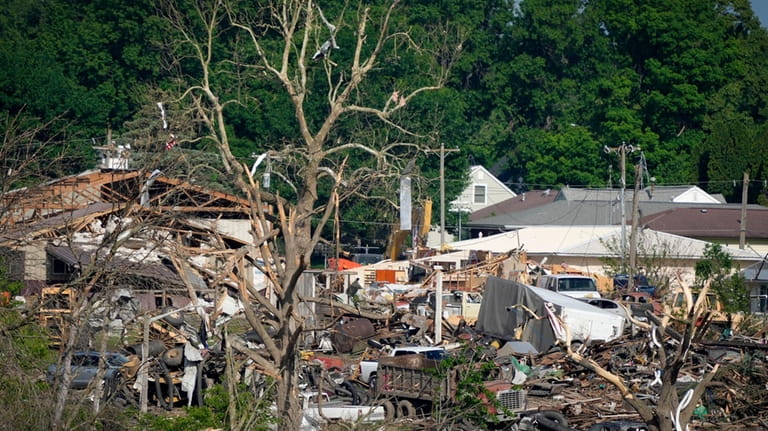 Tornado damaged property is seen, Wednesday, May 22, 2024, in...