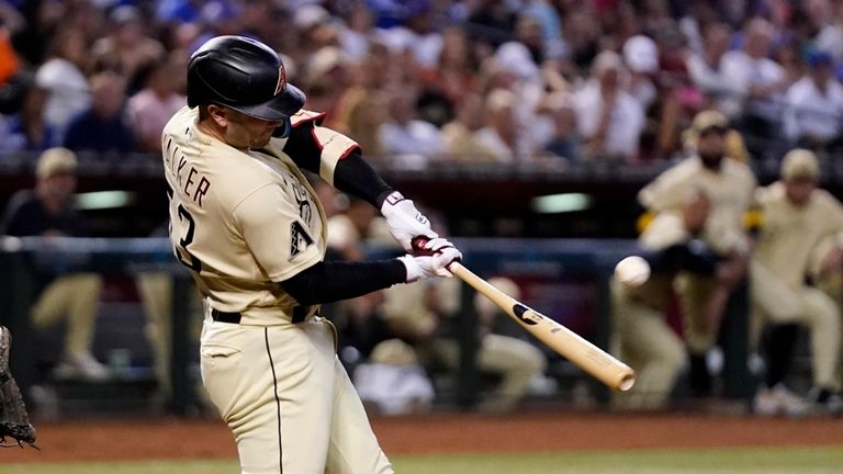 Arizona Diamondbacks' Christian Walker connects for a run-scoring double against...