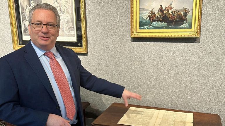 Historian Seth Kaller shows off a 1787 copy of the...