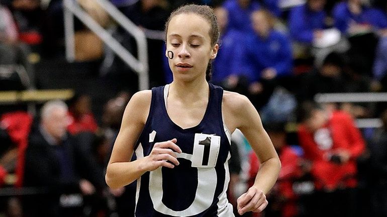 Oceanside's Andria Scaglione takes the girls 3,000-meter run in 11:11.12...