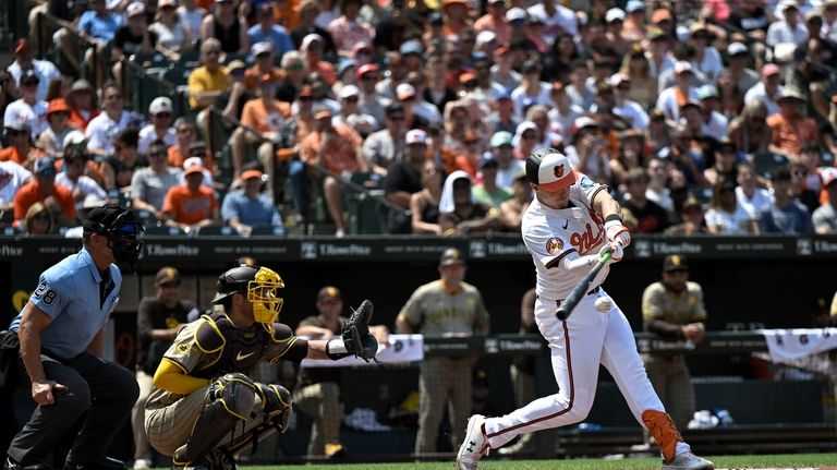 Baltimore Orioles' Ryan Mountcastle, right, hits a two-run single off...