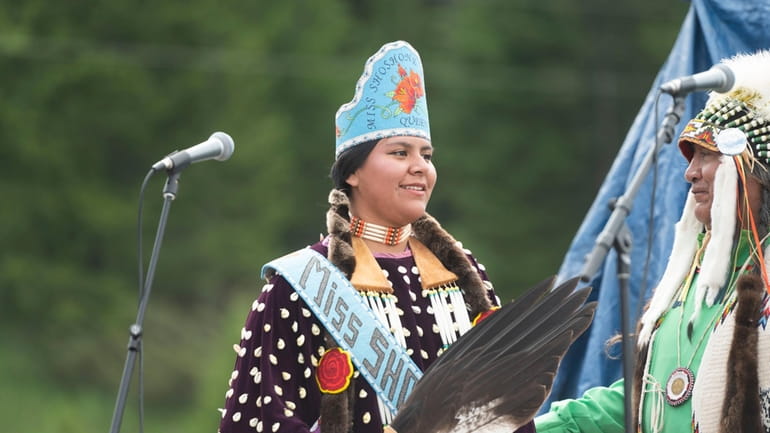 Miss Shoshnone-Bannock Queen Develynn Hall takes the stage during a...