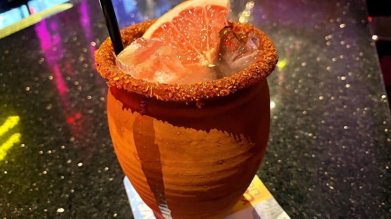 A cantarito is a bubbly tequila drink with grapefruit and...