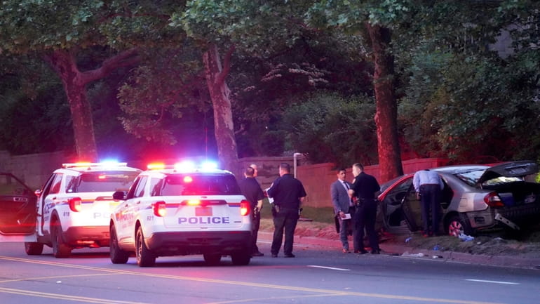 Nassau police investigate a serious crash in Flower Hill Sunday.