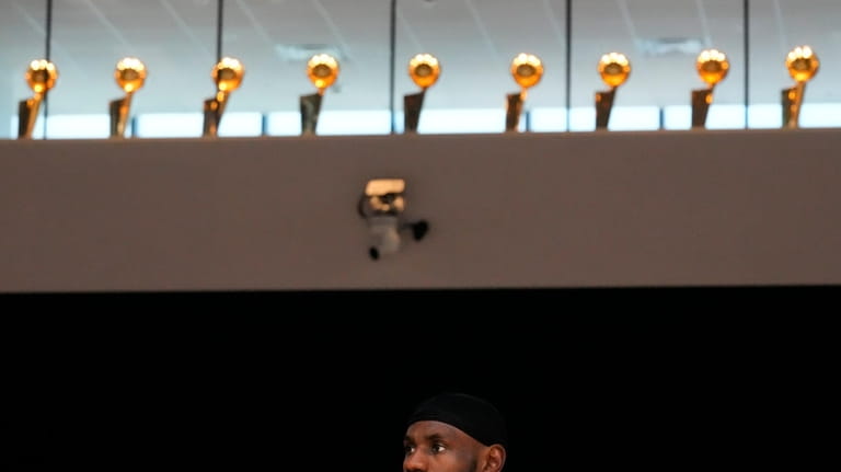 Championship trophies line along the window as Los Angeles Lakers'...
