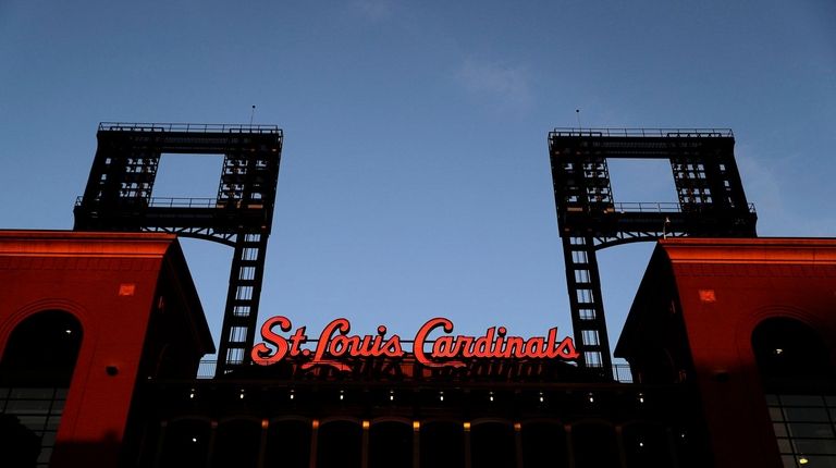 The lights inside an empty Busch Stadium, home of the...