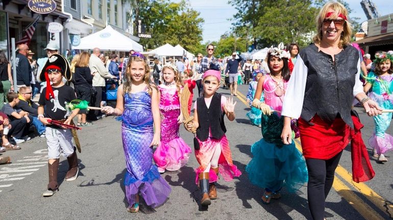 Pat Snyder, right, executive director of the East End Arts...