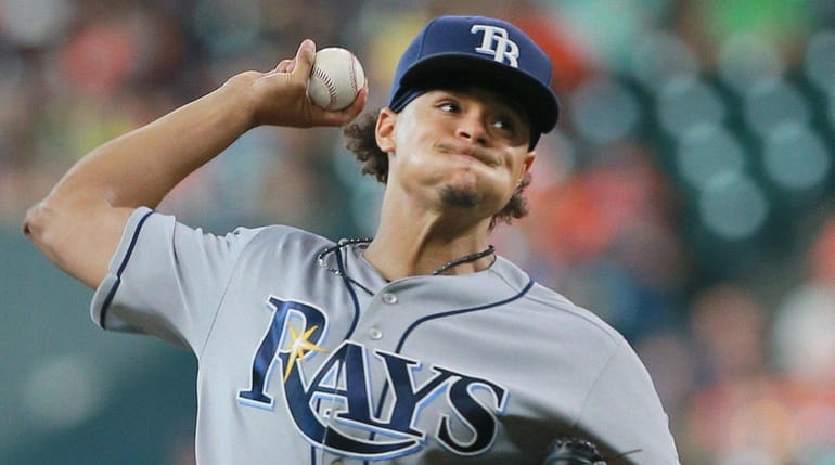 Chris Archer #22 of the Tampa Bay Rays pitches in...