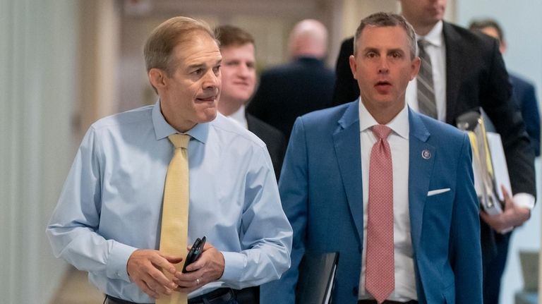 Rep. Jim Jordan, R-Ohio, left, arrives to hear from U.S....