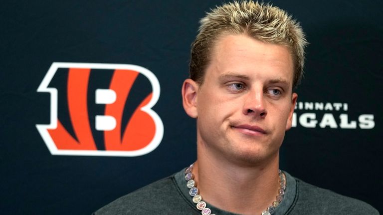 Cincinnati Bengals quarterback Joe Burrow talks to the media after...