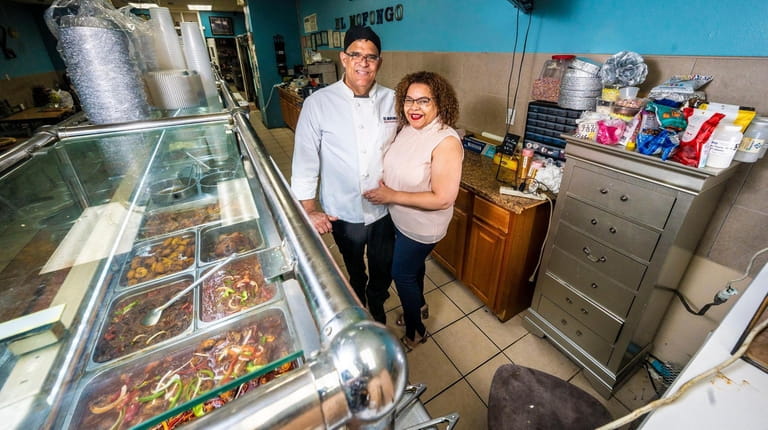 Martha Caro and her husband Hector Henriquez, owners of El...