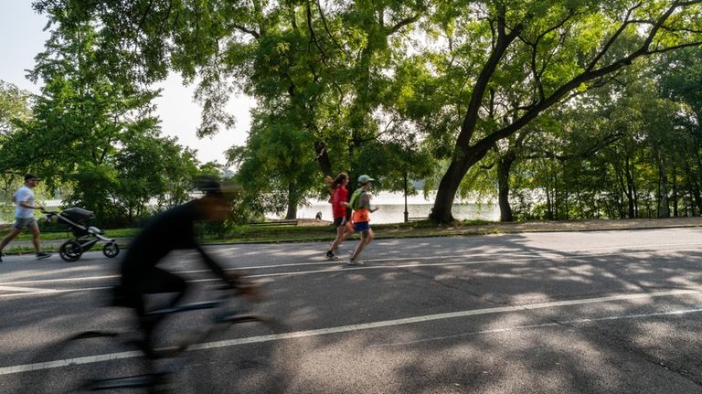 People enjoy an afternoon of activities in Brooklyn's Prospect Park.