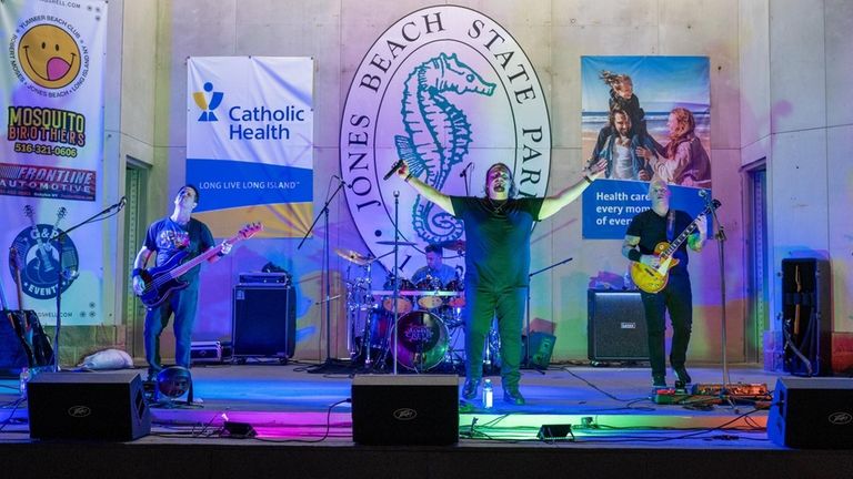 A Creed cover band performs at the Jones Beach Bandshell.