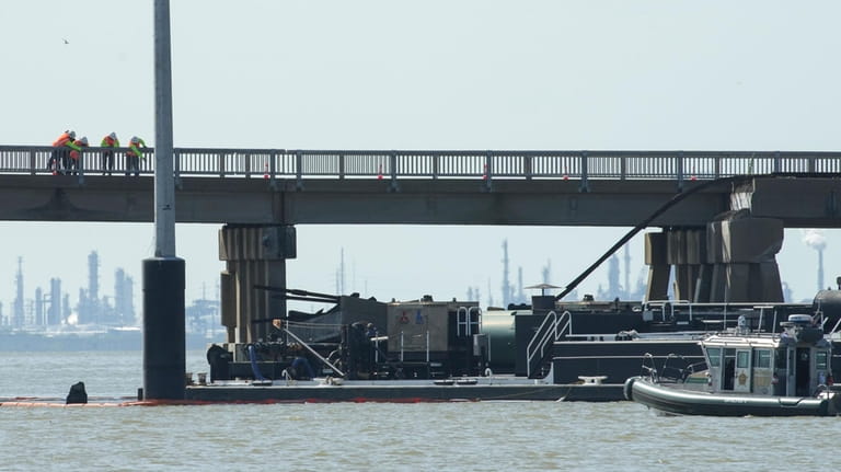 Officials respond after the Pelican Island Bridge was closed when...