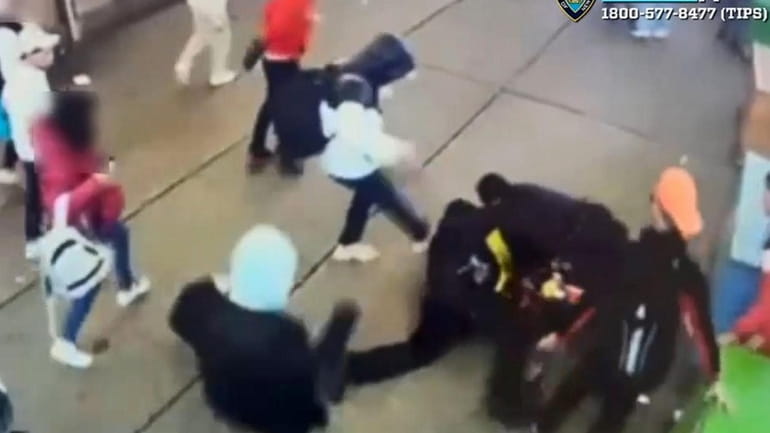 A security video captures two NYPD officers being attacked while...