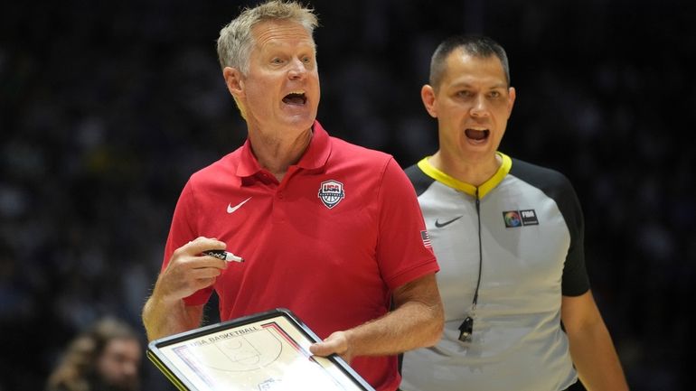 United States' head coach Steve Kerr gestures to his players...