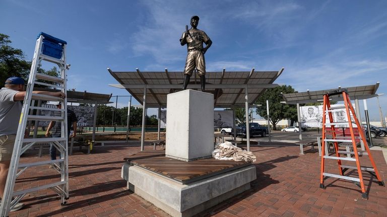 A statue of baseball hall-of-famer and civil rights pioneer Jackie...