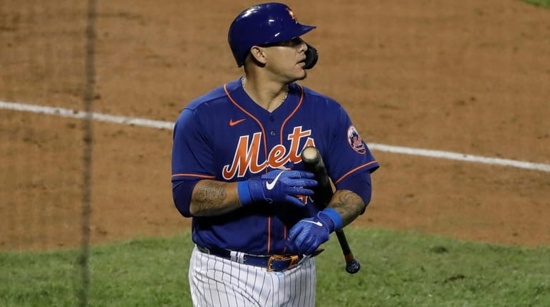 New York Mets' Wilson Ramos reacts after striking out during...