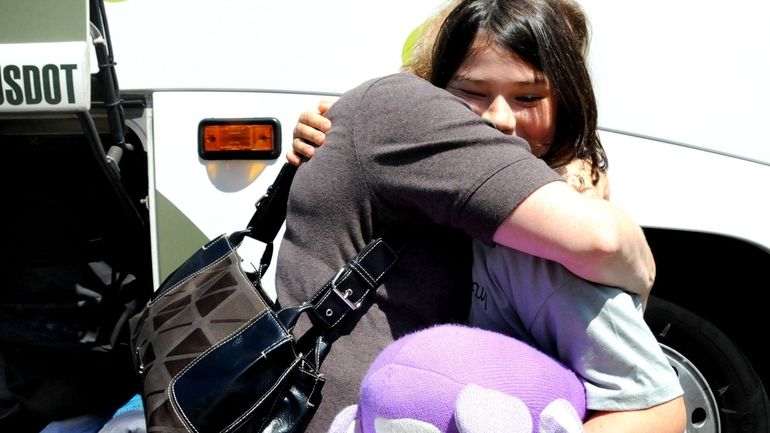 Marisa Kerr, 10, and her mom Margaret reunite in Garden...