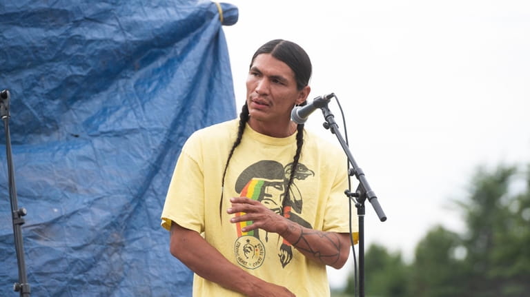 Devin Oldman, a member of the Northern Arapahoe tribe, speaks...