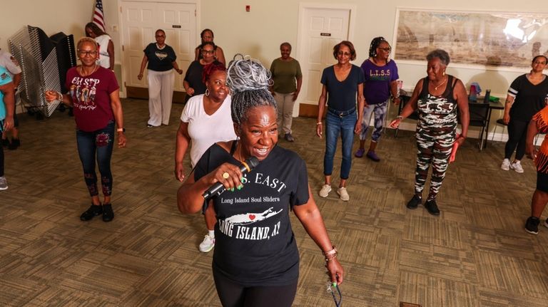 The LI Soul Sliders' Sardia Lewis leads a dance at...