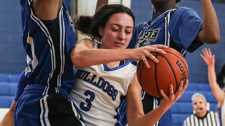 North Babylon's Brianna Lavalle gets double teamed during a Suffolk...