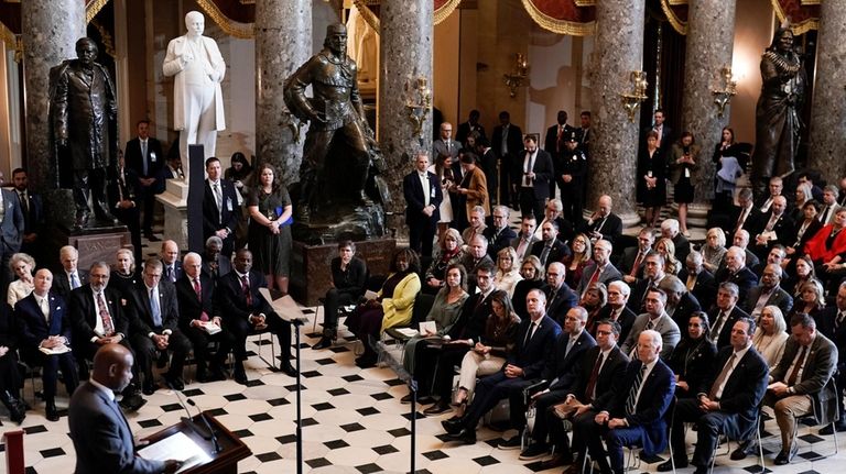 President Joe Biden, with from left, House Minority Leader Hakeem...