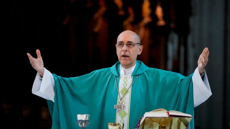 Monsignor Victor Manuel Fernandez, archbishop of La Plata, officiates a...