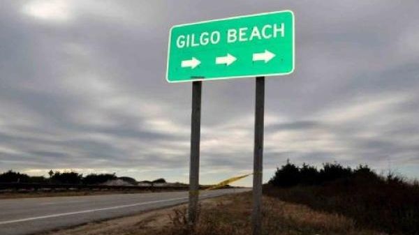 A sign along the westbound lanes of Ocean Parkway in...