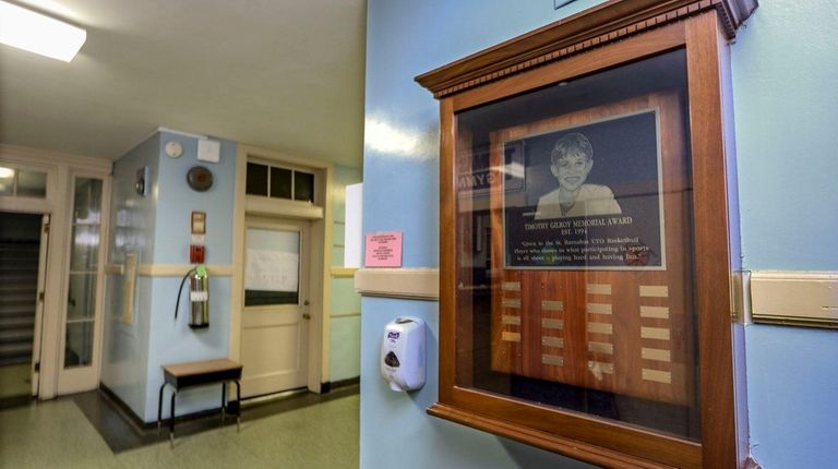 A tribute to Timmy Gilroy hangs at St. Barnabas -...