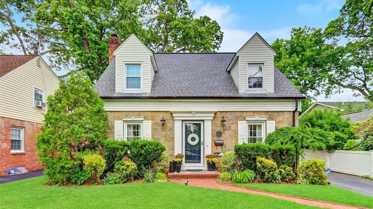 Priced at $799,900, this Colonial on Winfield Place has a...