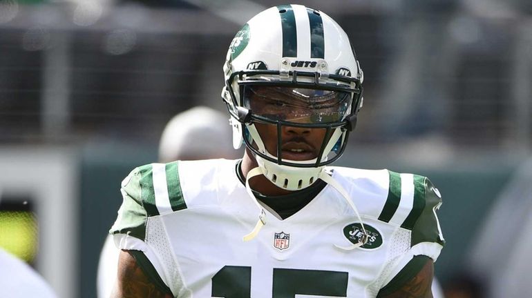 New York Jets wide receiver Brandon Marshall looks on during...