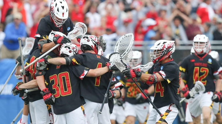 Maryland celebrates their come from behind win during the NCAA...