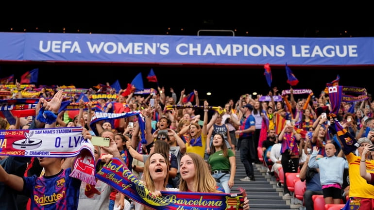 Barcelona's fans cheer for their team prior to the women's...