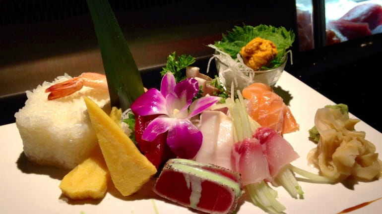The chirashi is elaborately arranged at Kobe Hibachi Sushi Lounge,...