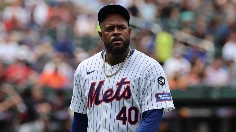 Mets pitcher Luis Severino leaves the game at the end...