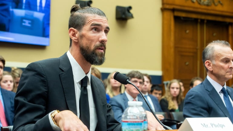 Michael Phelps, former Olympic athlete, testifies during a House Committee...