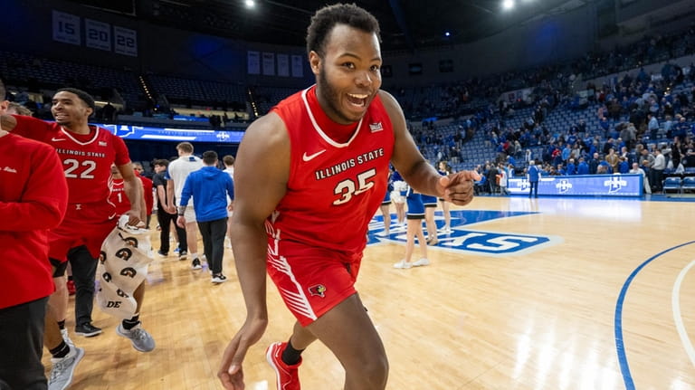 Illinois State forward Chase Walker races off the court after...