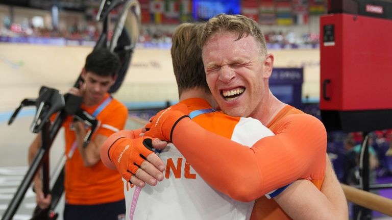 Patrick Bos, of the Netherlands, reacts after winning the gold...