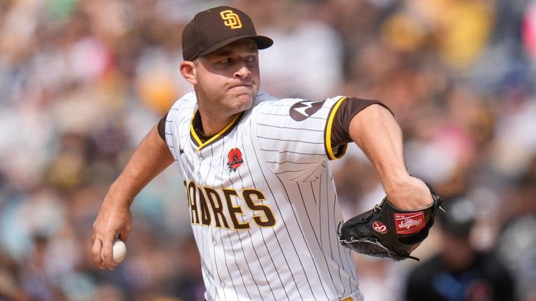 San Diego Padres starting pitcher Michael King works against a...