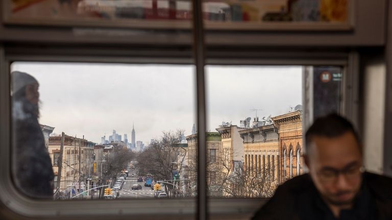 Robert Calabretta rides the subway Thursday, Feb. 15, 2024, in...