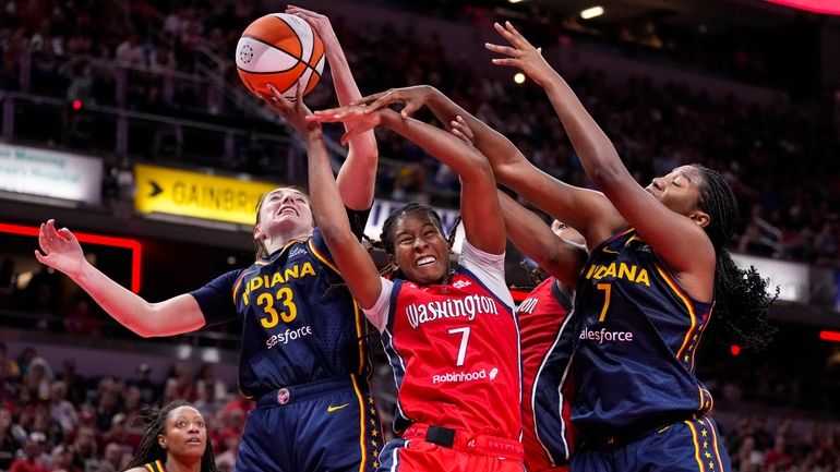 Washington Mystics guard Ariel Atkins (7) goes up for a...