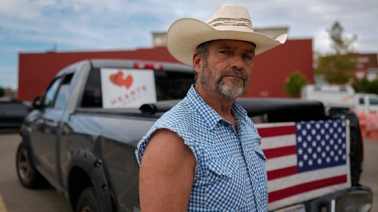 Cowboy David Graham, of Newark, Ohio, on hand with a...