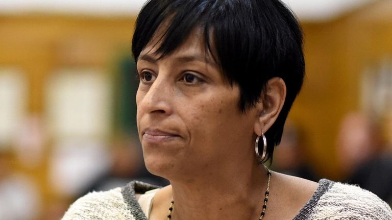 Anti-gang activist Evelyn Rodriguez addresses the Brentwood school board during...