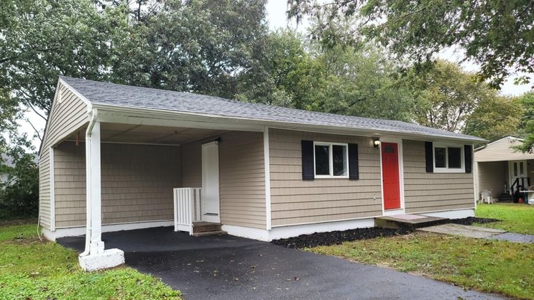 This $399,000 Bellport home features a new roof and siding.