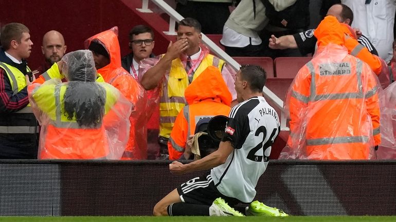 Fulham's Joao Palhinha celebrates after scoring his side's second goal...